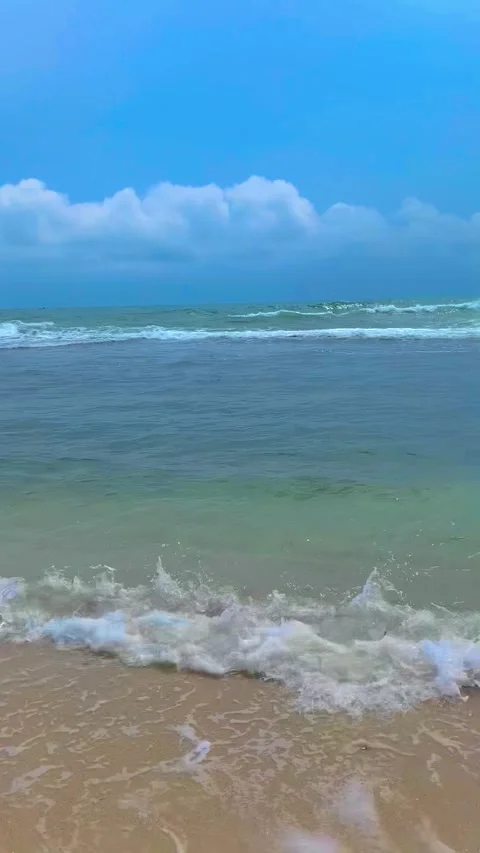 Waves Rolling Onto Shore at Ngobaran Beach Yogyakarta Indonesia Stock Footage 336685293