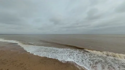 Waves rolling in on the Suffolk coast Video stock 237091450