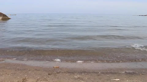 Waves rolling in at sunset (1 of 5) Stock Footage 50442543