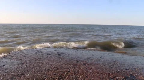 Waves rolling in at sunset (2 of 5) Stock Footage 50442580