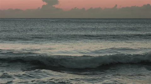 Waves rolling in timelapse sunset in 4K Stock Footage 42432963