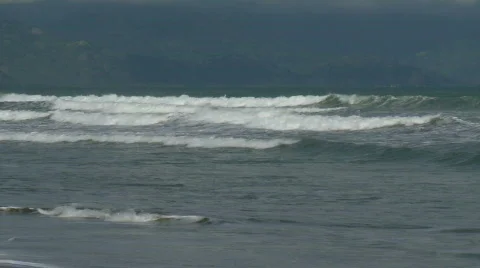 Waves rolling towards the sandy beach Video stock 609468