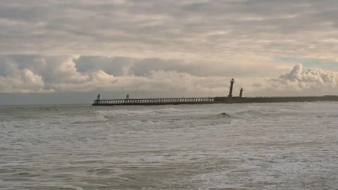 Waves rolling in at Whitby beach on the North Yorkshire coast (slow motion) Stock-Footage 287749693