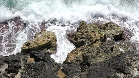 Waves on rugged rocky coast Cala Blava Mallorca in 4K 스톡 동영상 333479260