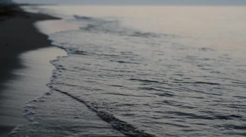 Waves run ashore Stock Footage 59860586