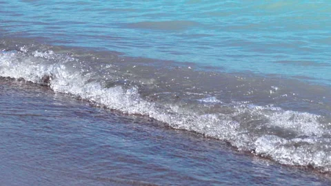 Waves run ashore Stock Footage 159718692