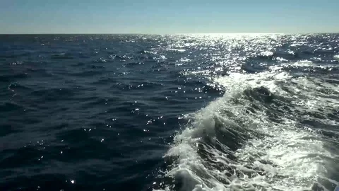 Waves running from under hull of pleasure boat. Black Sea, Crimea, Yalta. Stock Footage 106491519