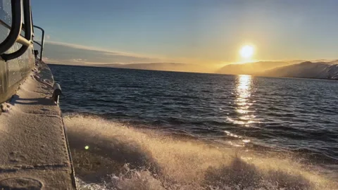Waves from a sailing yacht in the sun Stock Footage 219627461
