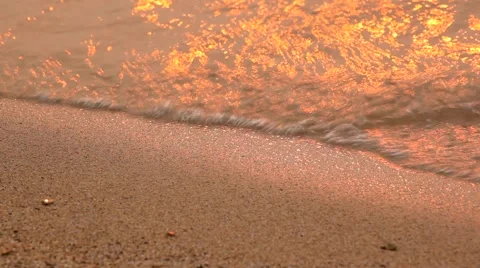 The waves, the sand and the sunset Stock Footage 61309868