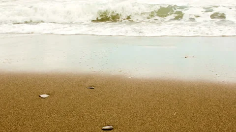 Waves on sand beach. Close-up. Stock Footage 55728035