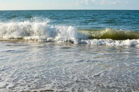 A waves on sand beach Stock Photos