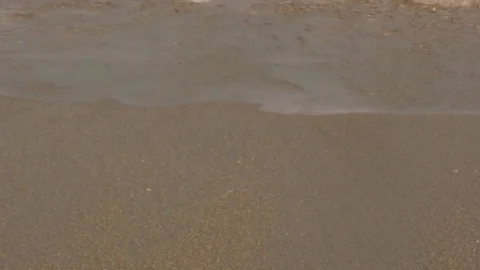 Waves on sand Stock Footage 92370322