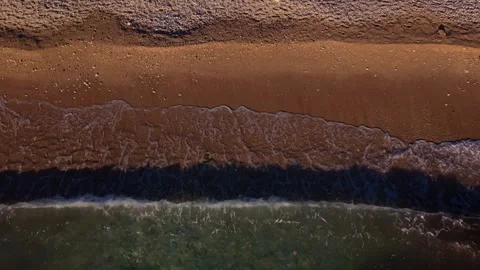 Waves on sand Stockbeeldmateriaal 341613165