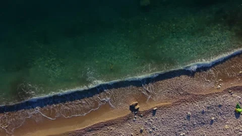 Waves on sand on kakome Stockbeeldmateriaal 341611864