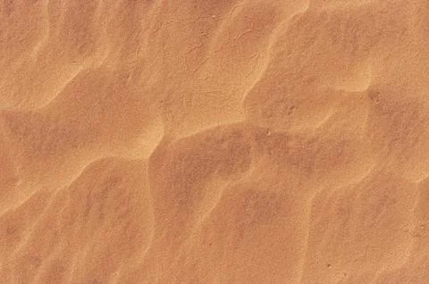 Waves of sand pattern in hot desert Foto stock