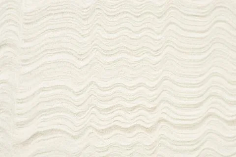 Waves on sand Stock Photos