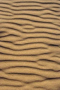 Waves of sand Stock Photos