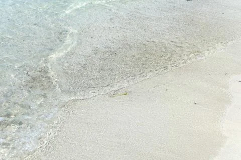 Waves on sand Stock Photos