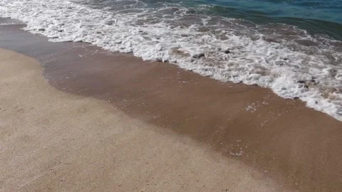 Waves on the sand in slow motion Stock Footage 224293773