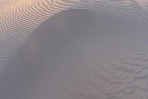Waves of Sand Texture, Dunes of the Desert. Stock Photos