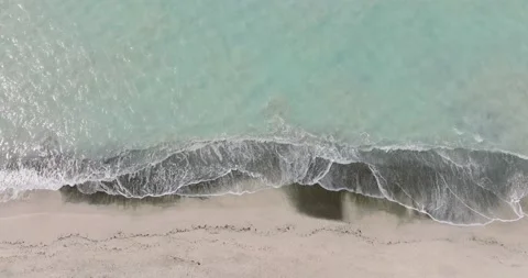 Waves on sandy beach. Aerial view of tropical beach. Top down view Stock Footage 191697371