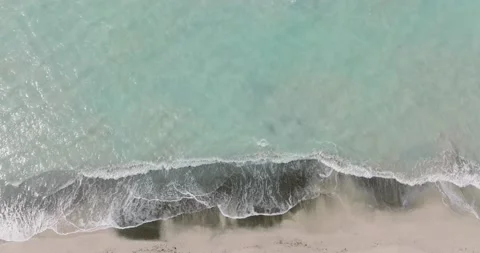 Waves on sandy beach. Aerial view of tropical beach. Top down view Stock Footage 191697869