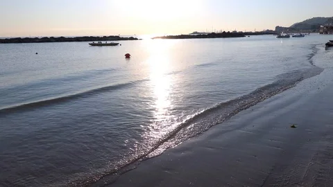 Waves on Sandy Beach Background at Sunrise or Sunset 스톡 동영상 120942051