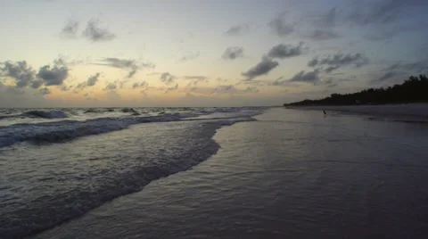 Waves on a Sandy Beach at Dusk Stock Footage 39489495