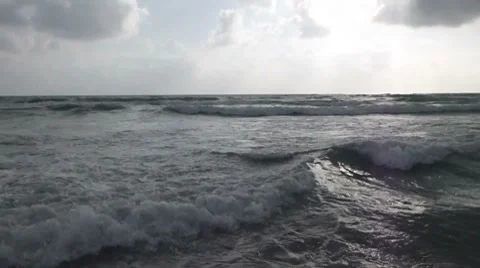 Waves on a sandy beach 스톡 동영상 8606779