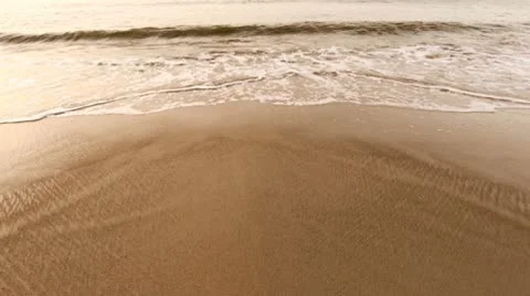 Waves on a sandy beach Stock Footage 10587720