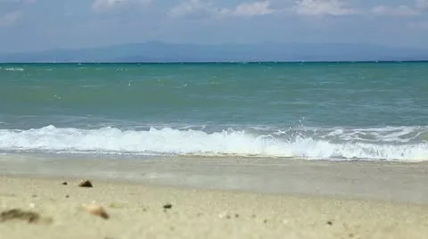 Waves on sandy beach Stock Footage 11874254
