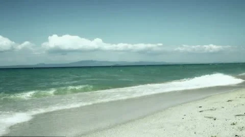 Waves on sandy beach Stock Footage 11874303