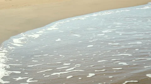 Waves on a sandy beach Stock Footage 59943242