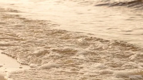 Waves on a sandy beach Vídeo Stock 76941030