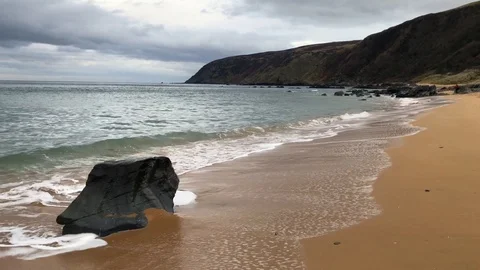 Waves on a sandy Beach Stock Footage 103253443