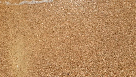 Waves on the sandy shore Stock Footage 109120591