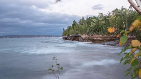 Waves on sculpted shore Stock Footage 72927503