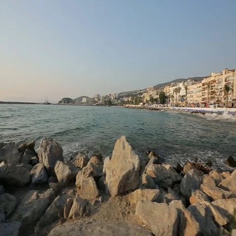 Waves of the sea among the rocks on the beach Stock Footage 69529293