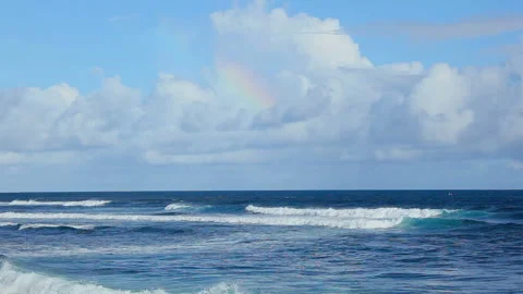 Waves on the Sea and a Rainbow in the Clouds Stock Footage 327254911