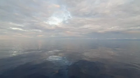 Waves in the sea and the reflection of light around it Stock Footage 297078170