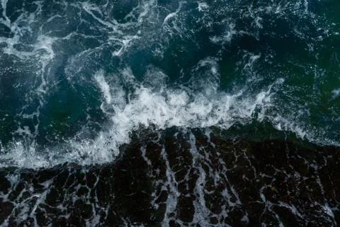 The waves in the sea background blue Stock Photos