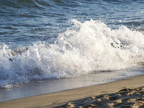 Waves on the sea beach Stock Photos