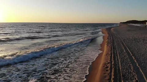 Waves on the sea beach at sunset Vídeos de archivo 163233583