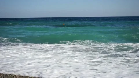 Waves of the sea. beautiful blue waves with white foam on the beach Video stock 142287810