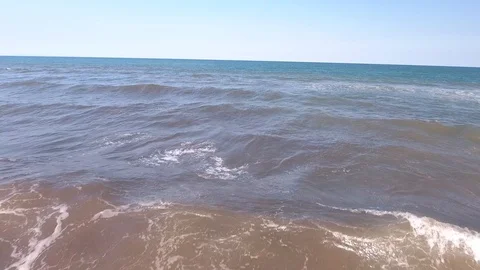 Waves of the sea from a bird's flight. Stockbeeldmateriaal 102581423