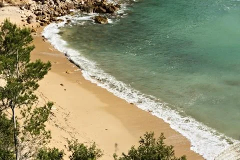 Waves of the sea break on the rocks. Stock Photos