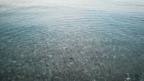 Waves of the sea break on the sand of a beach in Spotorno Stock Footage 209138301