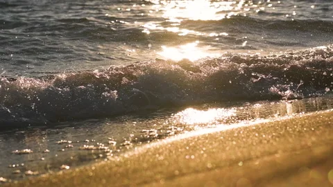 Waves on the sea coast at sunset Stock-Footage 139138942