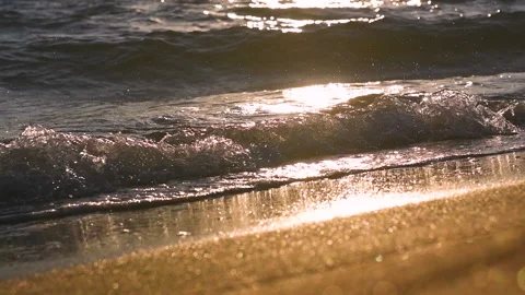Waves on the sea coast at sunset. Stock Footage 139139037