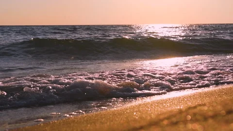 Waves on the sea coast at sunset. Stock Footage 139139056